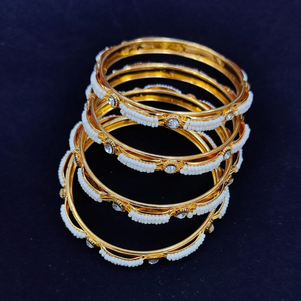 Pooja Bangles Gold Plated Austrian Stone And Pearls Bangles Set