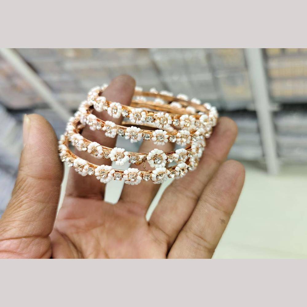 Pooja Bangles Gold Plated Austrian Stone And Pearls Bangles Set