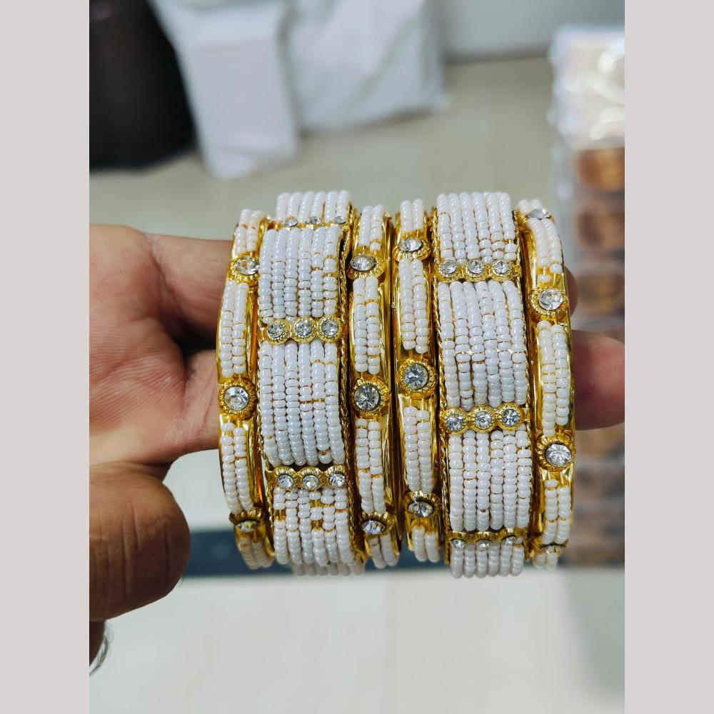 Pooja Bangles Gold Plated Austrian Stone And Pearls Bangles Set