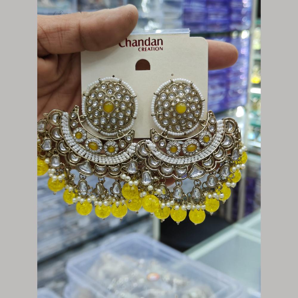 Pooja Bangles Gold Plated Kundan Stone And Pearl Dangler Earrings