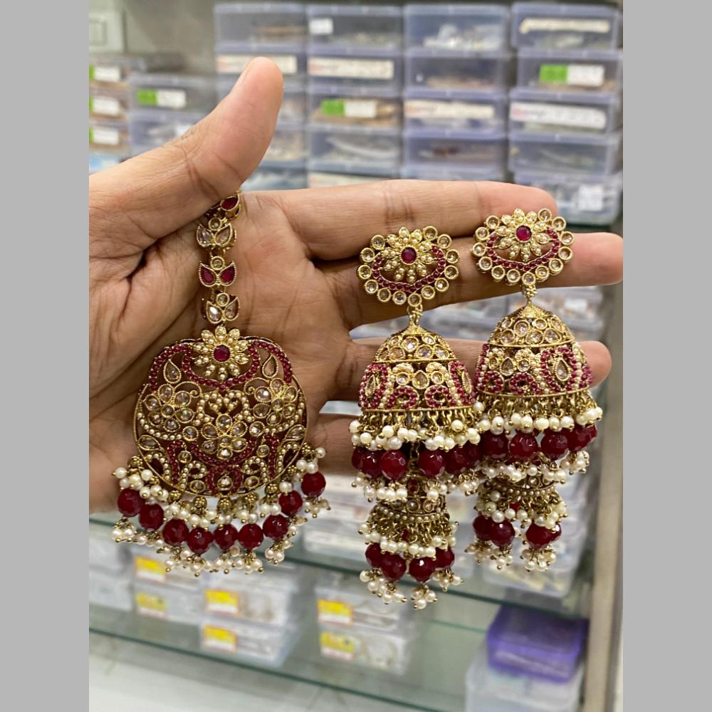 Hira Collections Gold Plated Crystal Stone And Pearls Jhumki Earrings With Maangtikka