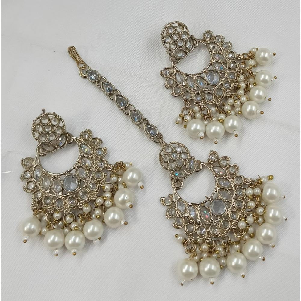 Akruti Collection Gold Plated Crystal Stone Earrings With Maangtikka