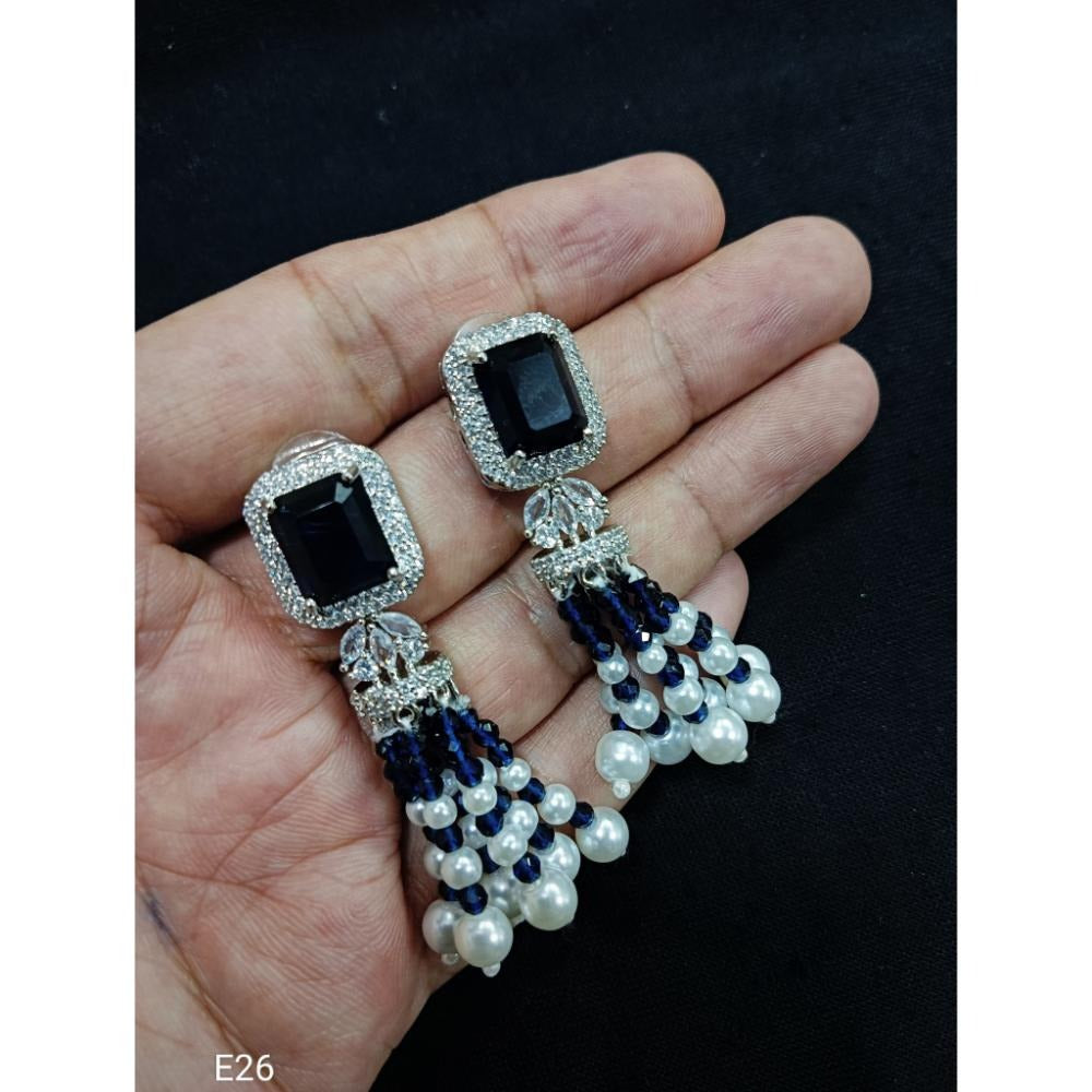 Akruti Collection Silver Plated AD And Pearls Dangler Earrings