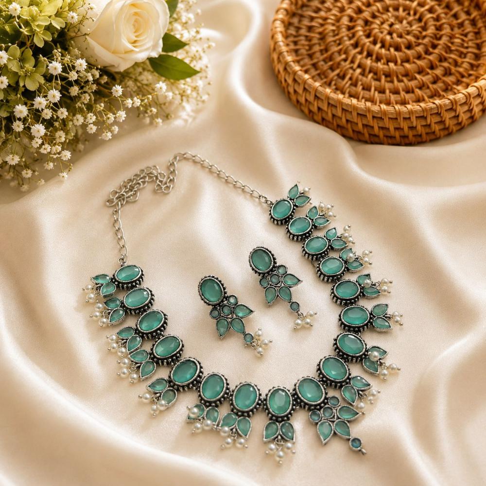 Akruti Collection Beautiful Oxidised Pota Stone And Pearl Jewellery Set