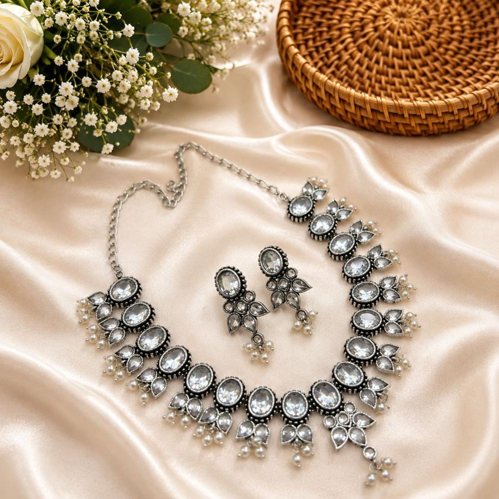 Akruti Collection Beautiful Oxidised Pota Stone And Pearl Jewellery Set