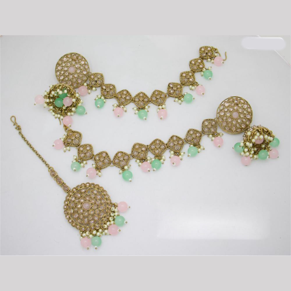 JCM Gold Plated Crystal Stone And Beads Jhumki With Maangtikka