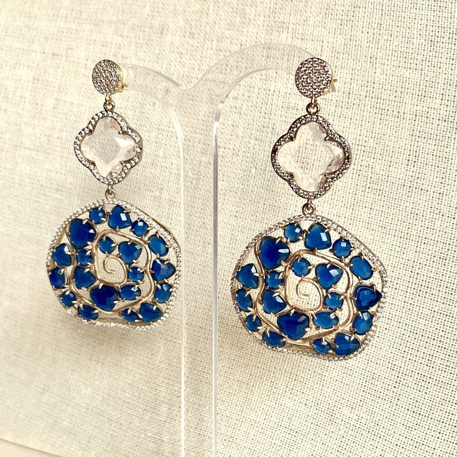 Jewel Treatzz Irregular Shaped Blue Doublet Stone, Transparent Four Petal Clover Flower And CZ Stone Gold Plated Chandlelier Earrings