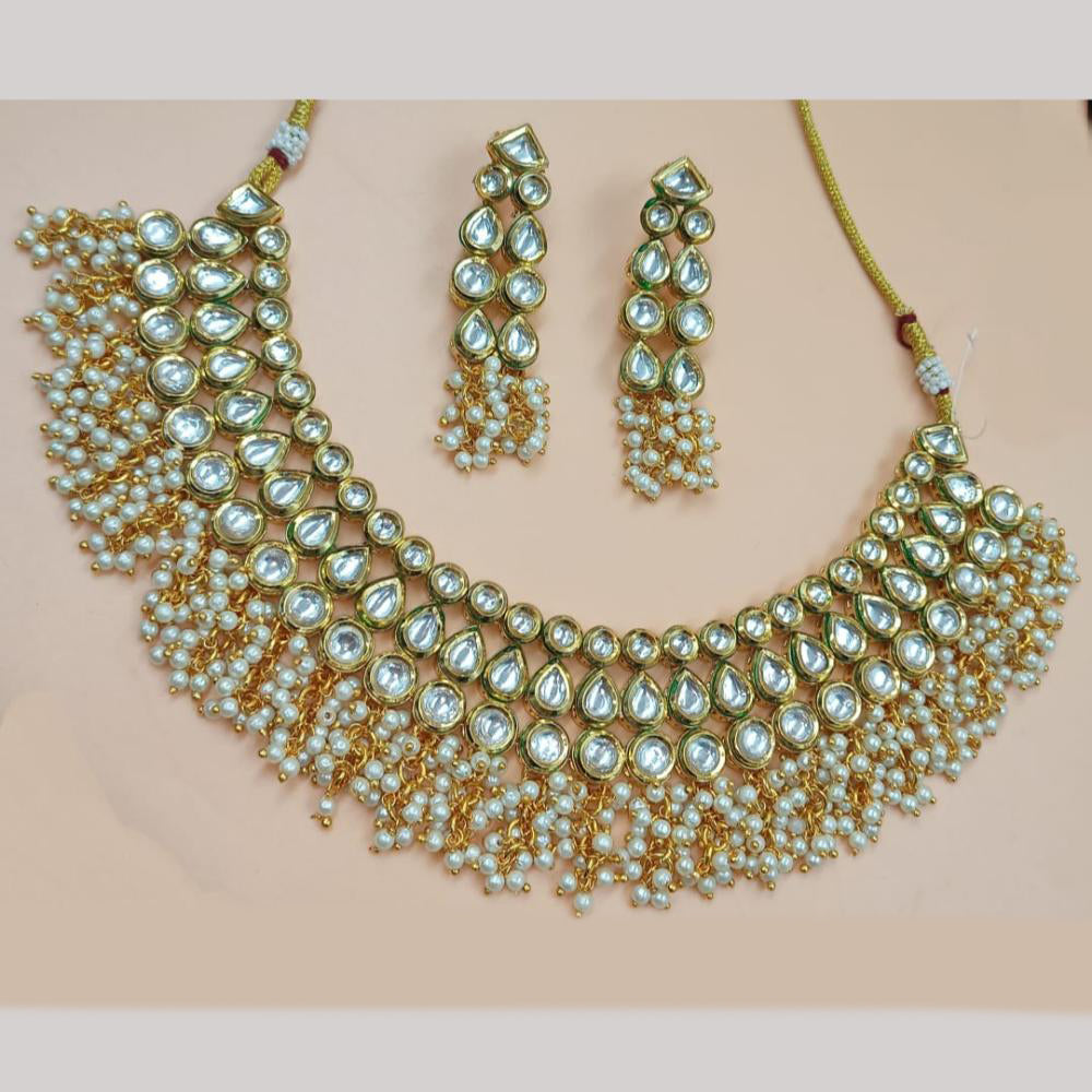 NAFJ Gold Plated Kundan Stone And Pearls Necklace Set