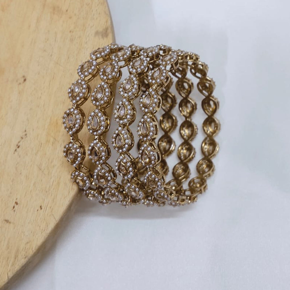 Tanish Art Jewellery Crystal And Pearl Bangles Set