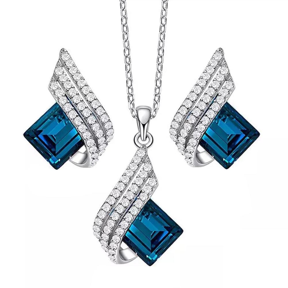 Mahi Shining Angel Wings Shaped Montana Blue and White Crystal Pendant Necklace Earrings Set for Women (NL1103810RMBlu)