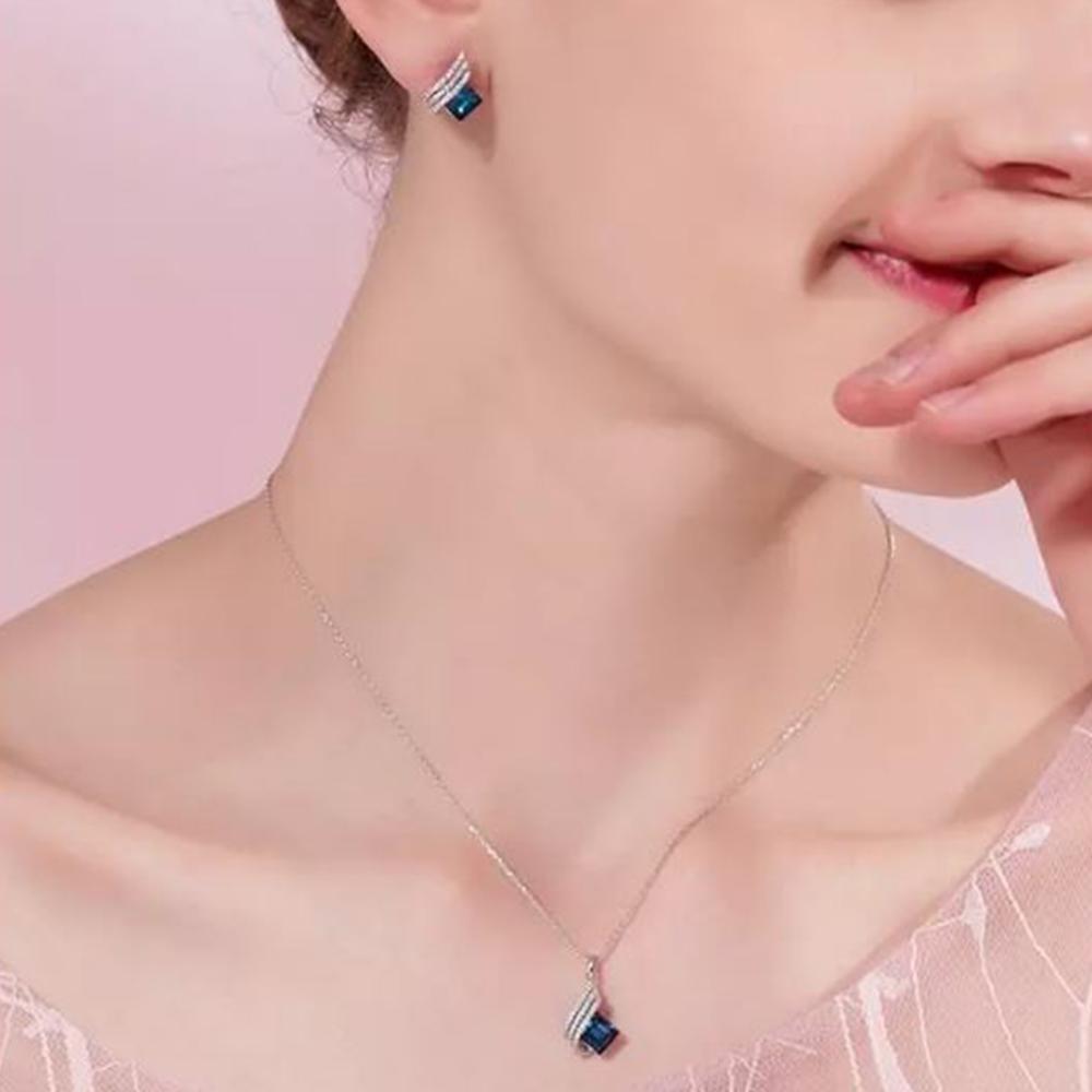 Mahi Shining Angel Wings Shaped Montana Blue and White Crystal Pendant Necklace Earrings Set for Women (NL1103810RMBlu)