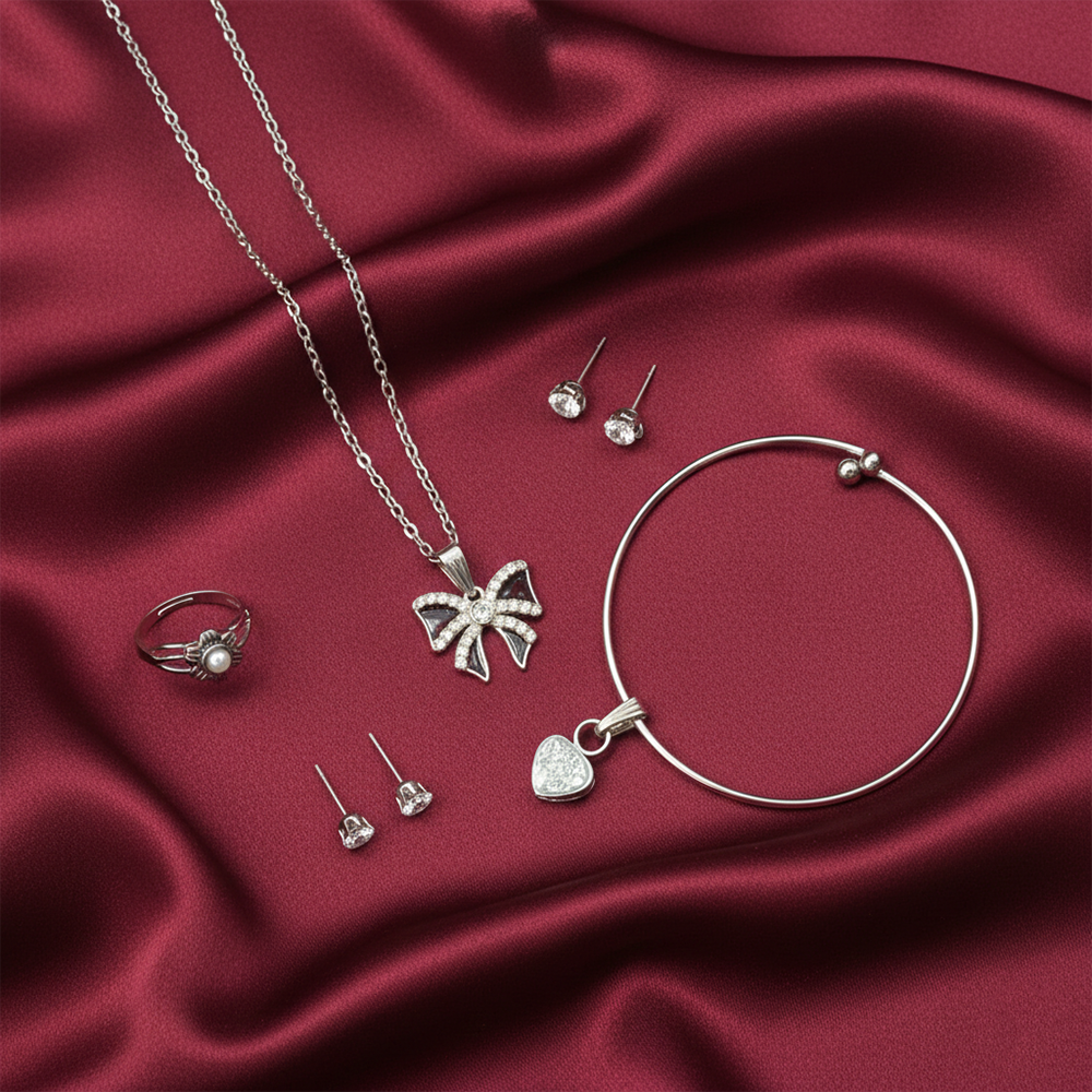 Urthn Silver Plated Bow Chain Pendant Earrings Rings And Bracelet Jewellery Combo Set (Pack Of 6)