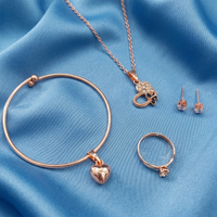 Urthn  Rose Gold Plated Chain Pendant Earrings Rings And Bracelet Jewellery Combo Set