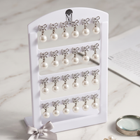 Urthn Cute Bow And Pearl Studs Earrings Combo for Party Wear
