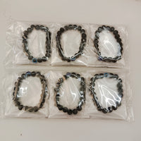 Urthn Evil Eye Black Beads Bracelet  (Set Of 12)