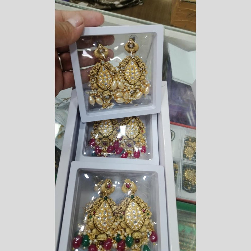 Om Creations Gold Plated Kundan And Pearl Dangler Earrings