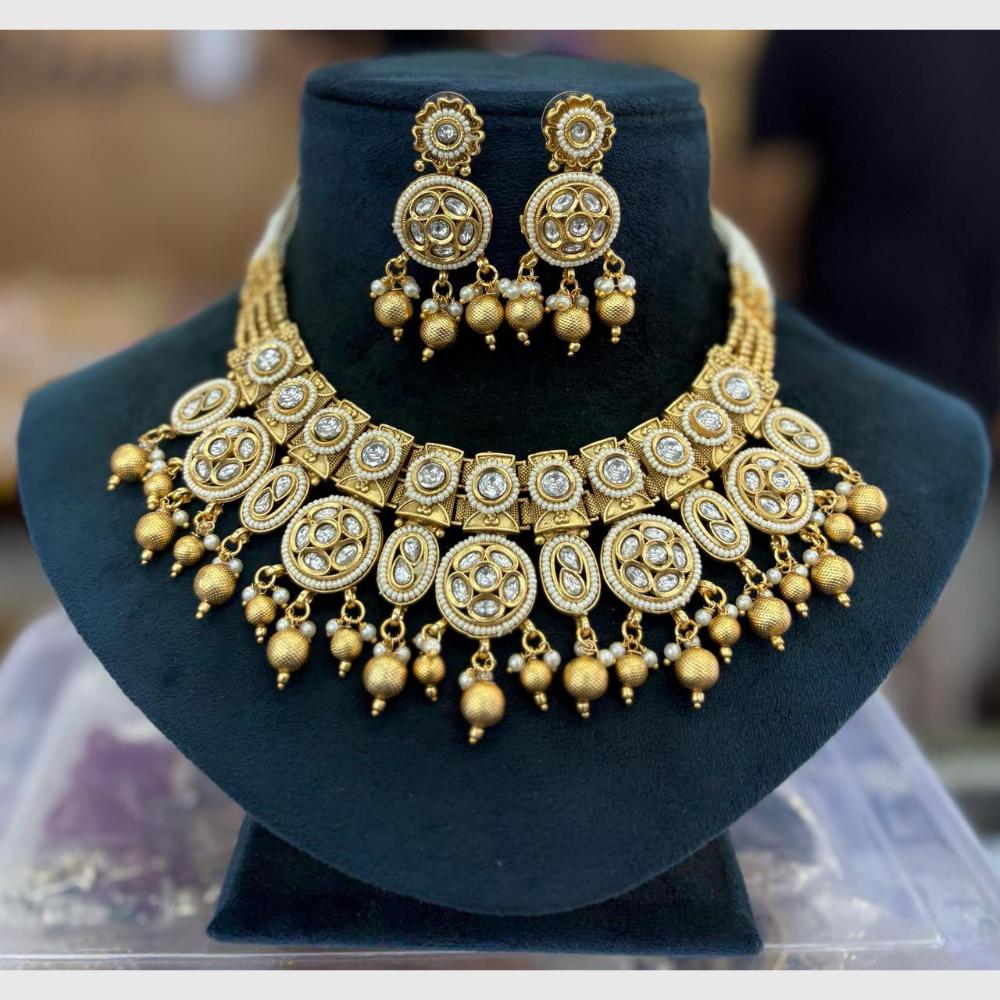 Manisha Jewellery Designer Gold Plated Adorned with Pota Stones and Pearls Necklace Set