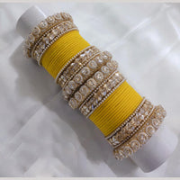 Lucentarts Jewellery Gold Plated Crystal Stone And Pearl Velvet Bangles Set