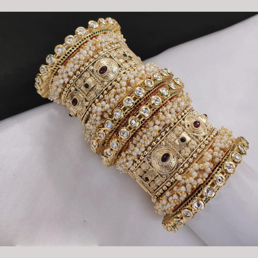 Lucentarts Jewellery Gold Plated Kundan And Pearl Bangles Set