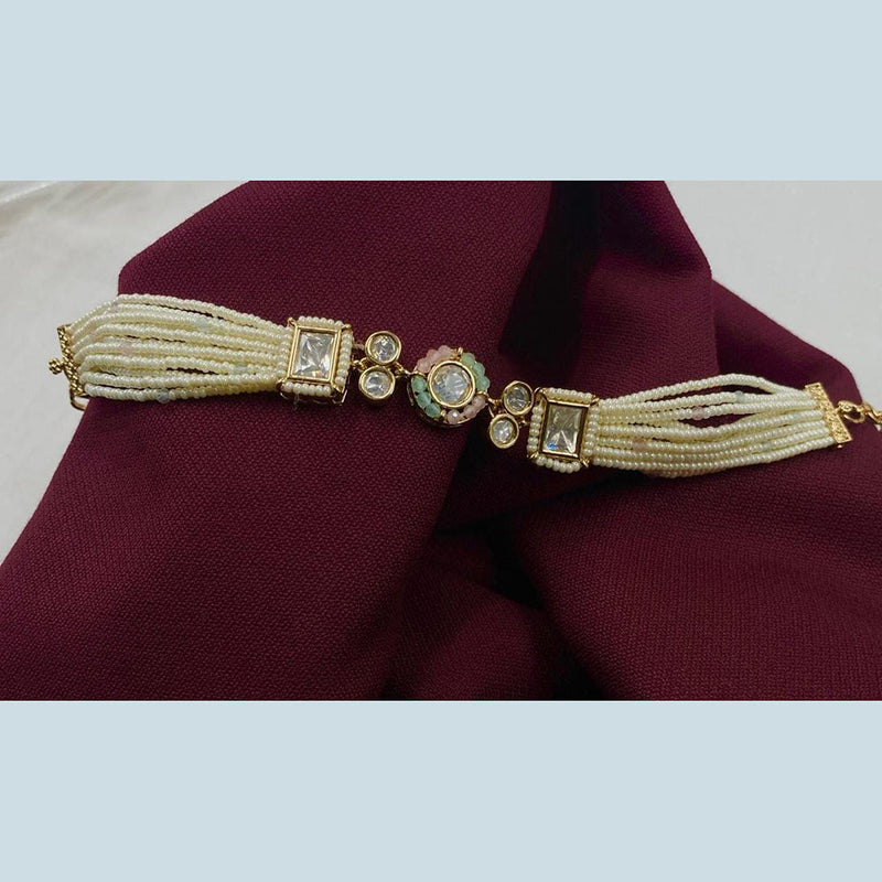 Shagna Gold Plated Polki Kundan Stone And Pearls Adjustable Bracelet