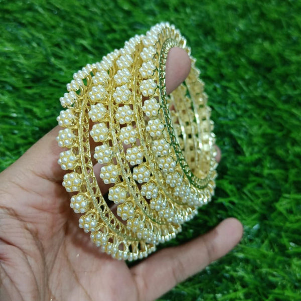 Pooja Bangles Gold Plated Pearl Bangle Set