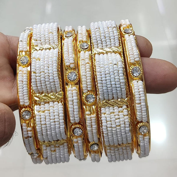 Pooja Bangles Gold Plated Austrian Stone And Pearl Bangles Set