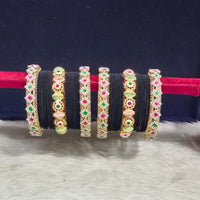 Pooja Bangles Gold Plated Pota Stone And Pearls Velvet Bangles Set
