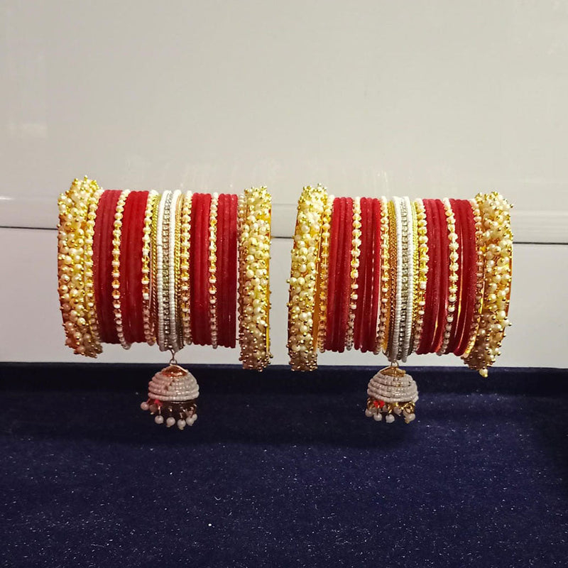 Pooja Bangles Gold Plated Austrian Stone And Pearls Velvet Bangles Set