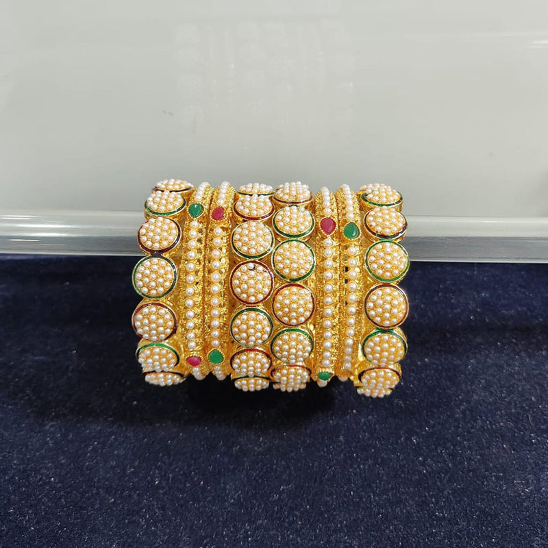 Pooja Bangles Gold Plated Pearl And Pota Stone Bangle Set