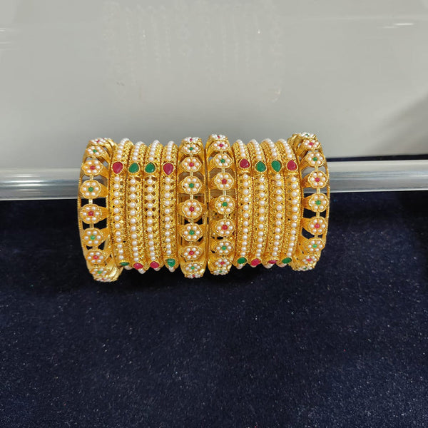 Pooja Bangles Gold Plated Pearl And Pota Stone Bangle Set