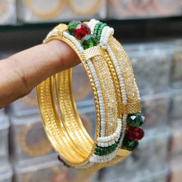 Pooja Bangles Gold Plated Austrian Stone And Pearls Bangle Set