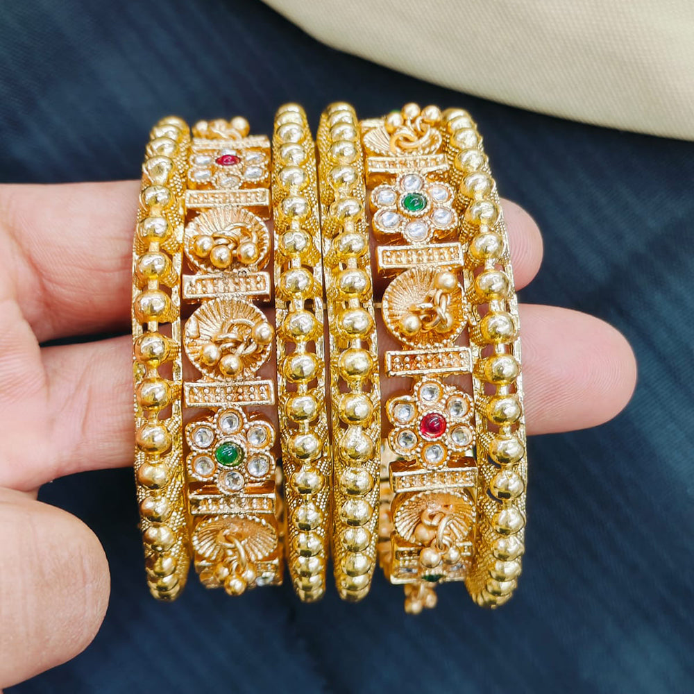 Pooja Bangles Gold Plated Pota Stone And Pearls Bangles Set