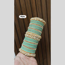 Pooja Bangles Delicate Gold Plated Pearl Work Bangles Set