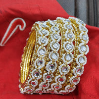 Pooja Bangles Gold Plated Kundan Stone And Pearl Bangle Set