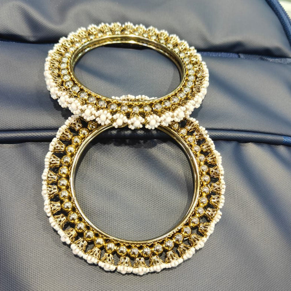 Pooja Bangles Elegant Sparkle Pearl And Beads Bangles Set