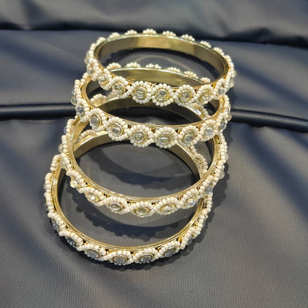 Pooja Bangles Royal Kundan Stone And Pearl Bangles Set