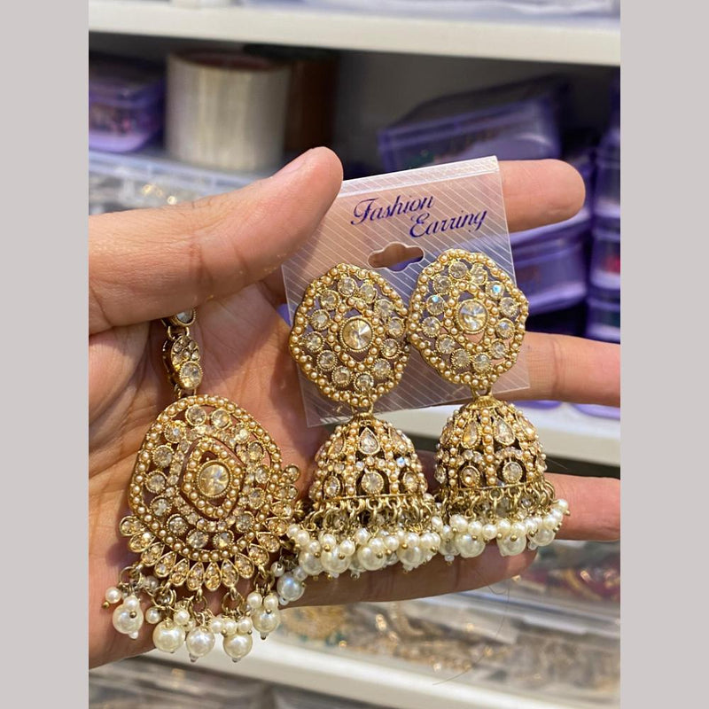 Hira Collections Gold Plated Crystal Stone And Pearls Jhumki Earrings With Maangtikka