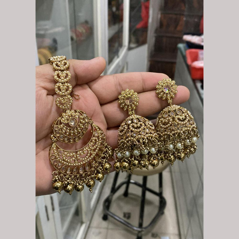 Hira Collections Gold Plated Crystal Stone And Pearls Jhumki Earrings With Maangtikka