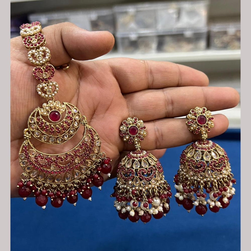 Hira Collections Gold Plated Crystal Stone And Pearls Jhumki Earrings With Maangtikka