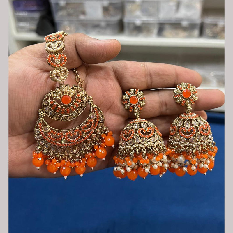 Hira Collections Gold Plated Crystal Stone And Pearls Jhumki Earrings With Maangtikka