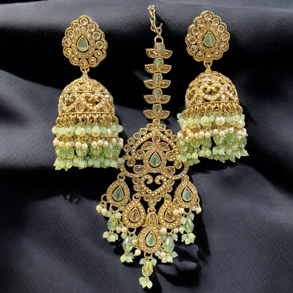 Hira Collections Gold Plated Crystals And Pearl Jhumki Earrings With Maangtikka