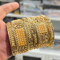 Hira Collections Royal Crystal Stone And Pearl Bangles Set