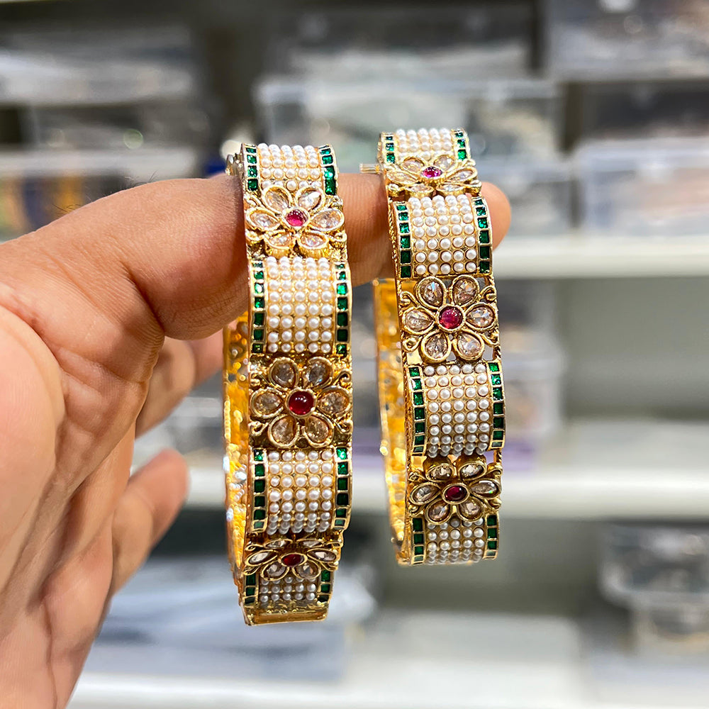 Hira Collections Royal Crystal And Pota Stone Pearl Bangles Set