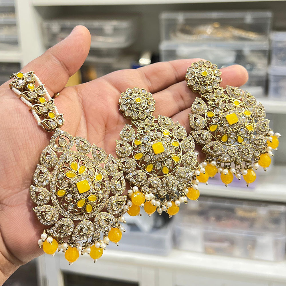 Hira Collections Royal Crystal Stone And Pearl Earring With Maangtikka