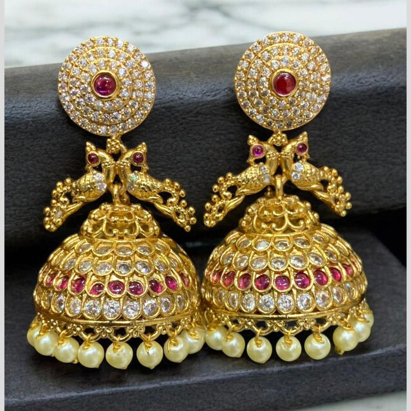 Sona Creation Gold Plated Pota Stoen And Austrian Stone Pearls Jhumki Earrings