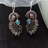 Akruti Collection Oxidised Plated Peacock Earrings