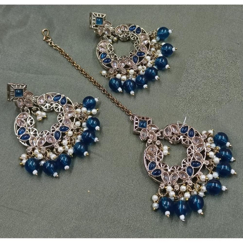 Akruti Collection Gold Plated Crystal Stone Earrings With Maangtikka