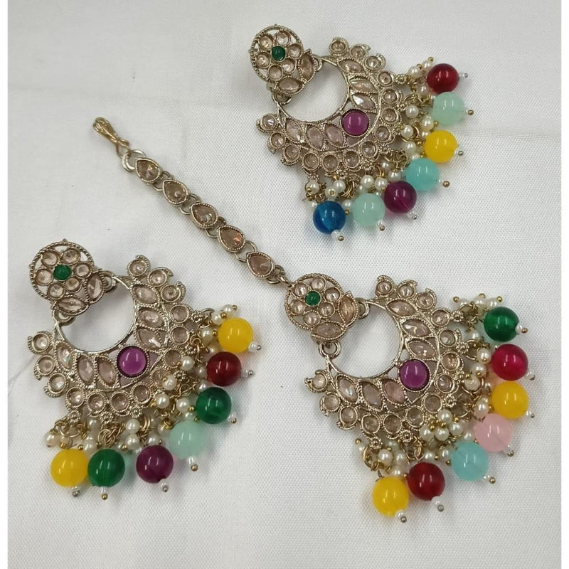 Akruti Collection Gold Plated Crystal Stone Earrings With Maangtikka