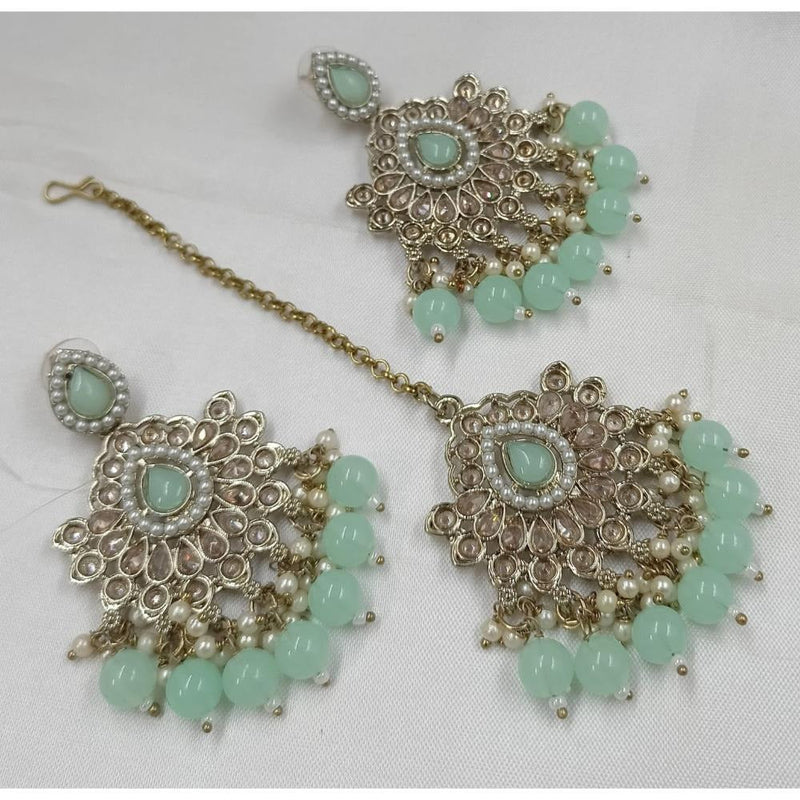 Akruti Collection Gold Plated Crystal Stone Earrings With Maangtikka