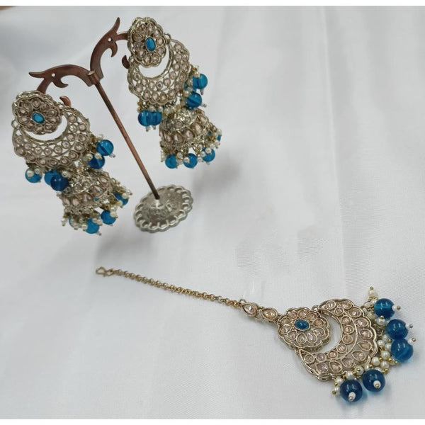 Akruti Collection Gold Plated Crystal Stone Earrings With Maangtikka